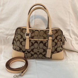 Cream and tan signature Coach purse with orange